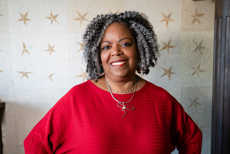 Headshot of patient smiling brightly after their dental procedure